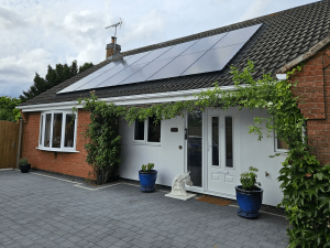 Solar panels on the roof of a UK detached bungalow